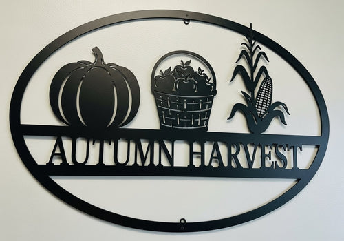 Oval Autumn Harvest metal sign with pumpkins and fall leaves in black steel