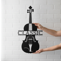 Violin with bow and music staff lines as black steel metal wall art