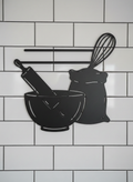 Personalized baking kitchen sign with mixing bowl, whisk and flour in black steel